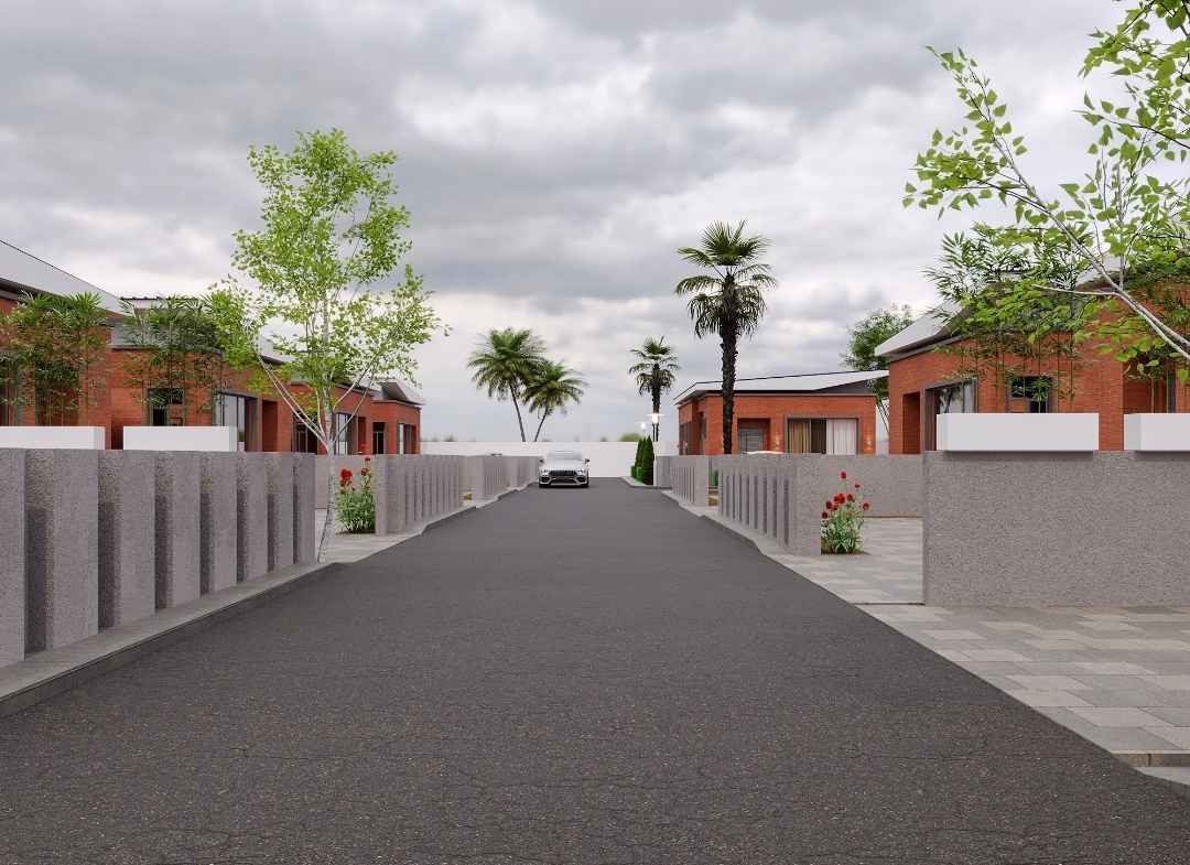 Residential street with brick houses and trees.