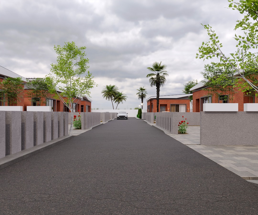 Residential street with brick houses and trees.